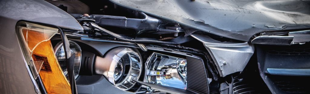 close up of a broken car headlight